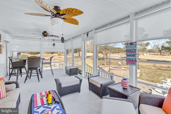 a bathroom with a shower and a glass door