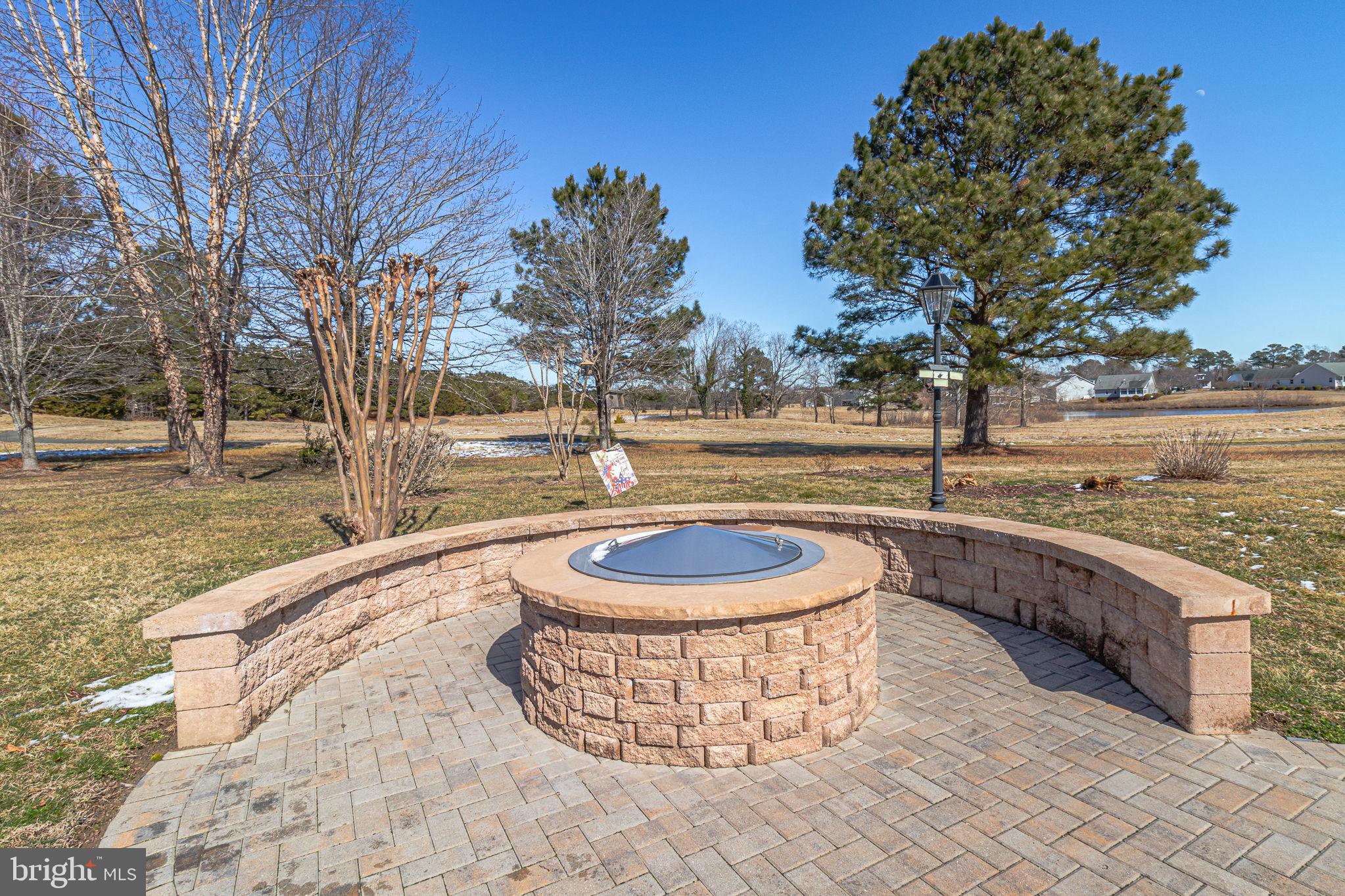 88 Old Field Road Irvington, VA 22480 - Photo 3 of 55 a view of a swimming pool with a patio and a yard