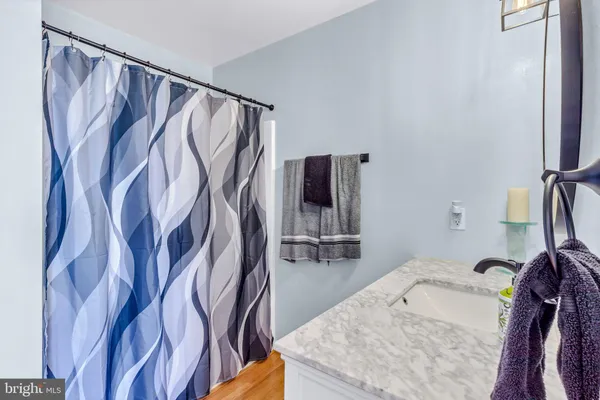 an aerial view of a house with yard swimming pool and outdoor seating