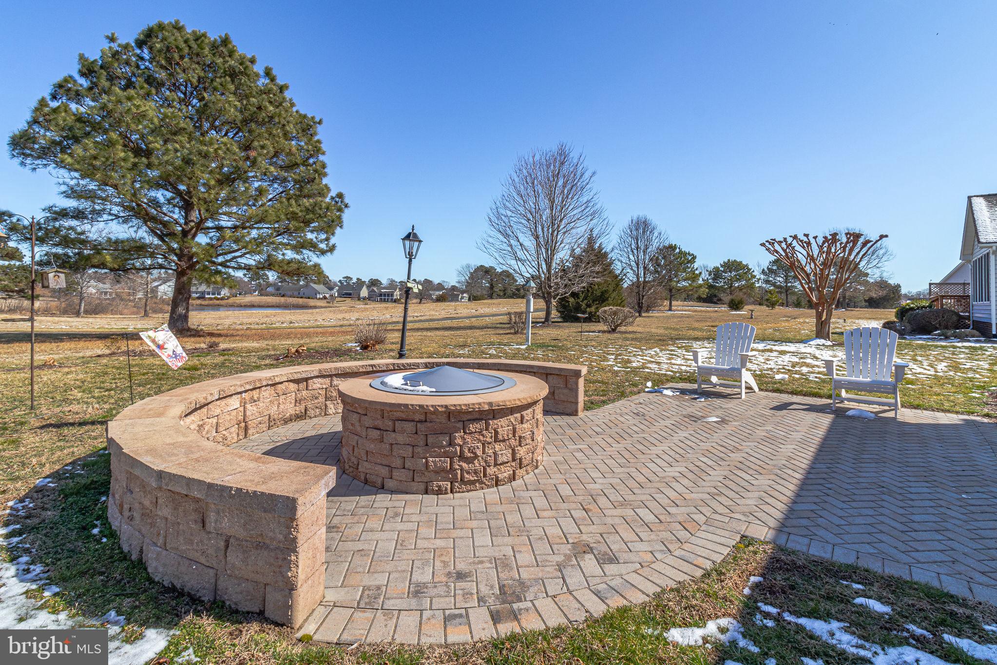88 Old Field Road Irvington, VA 22480 - Photo 49 of 55 a view of a swimming pool with a patio