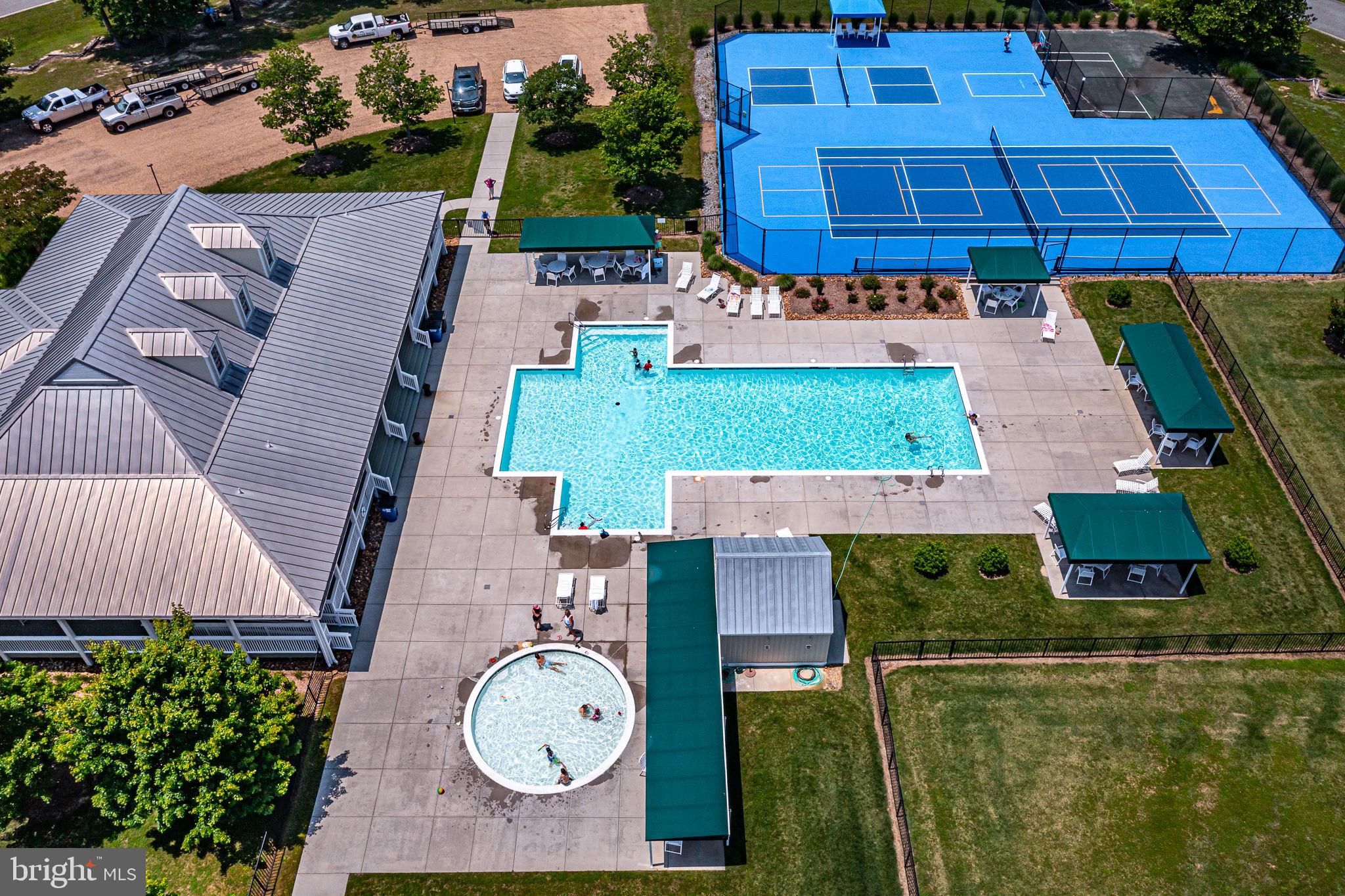 88 Old Field Road Irvington, VA 22480 - Photo 52 of 55 an aerial view of a house with garden space and outdoor seating