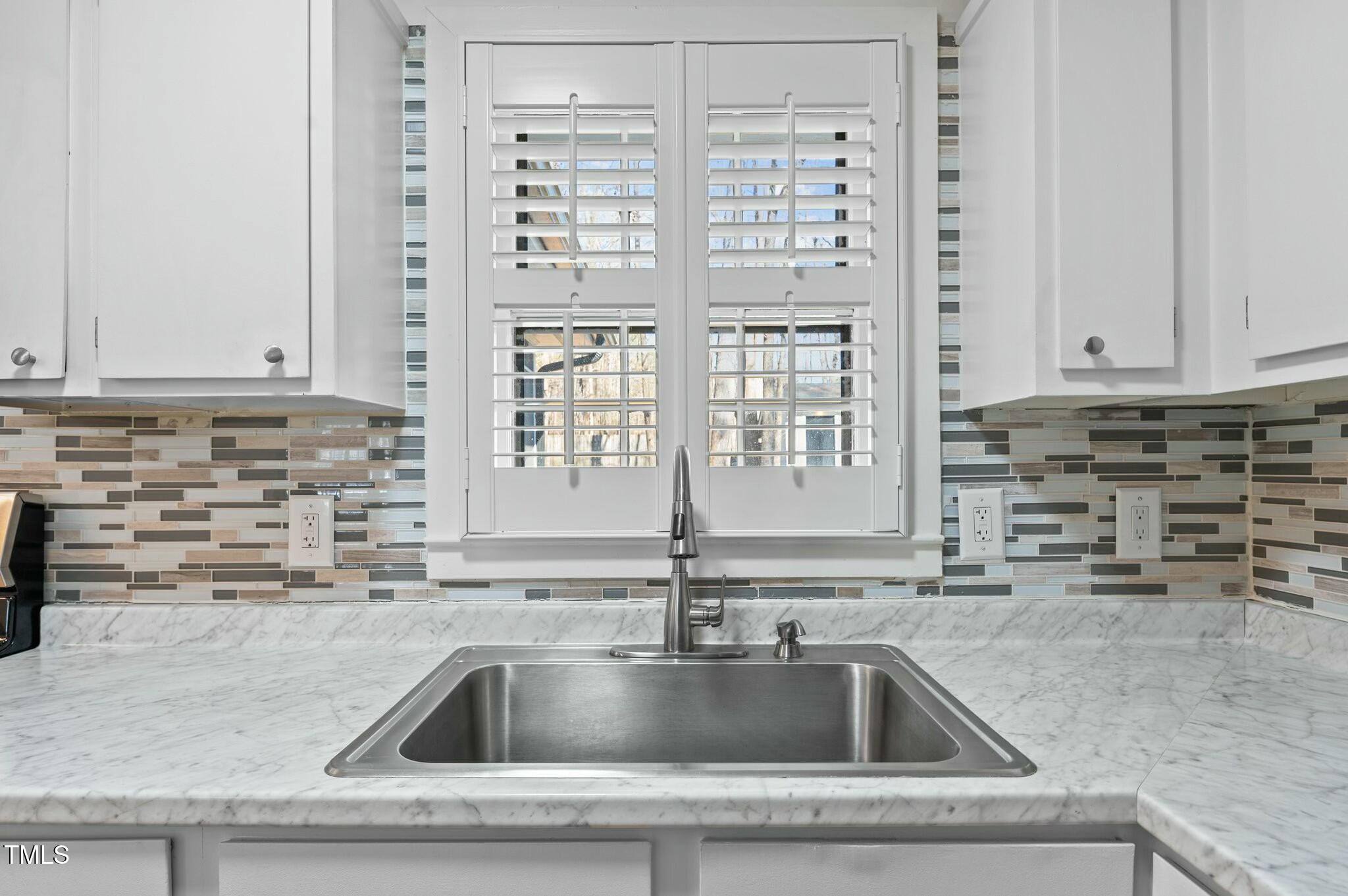 1014 Holden Road Youngsville, NC 27596 - Photo 19 of 54 a close view of sink and tap