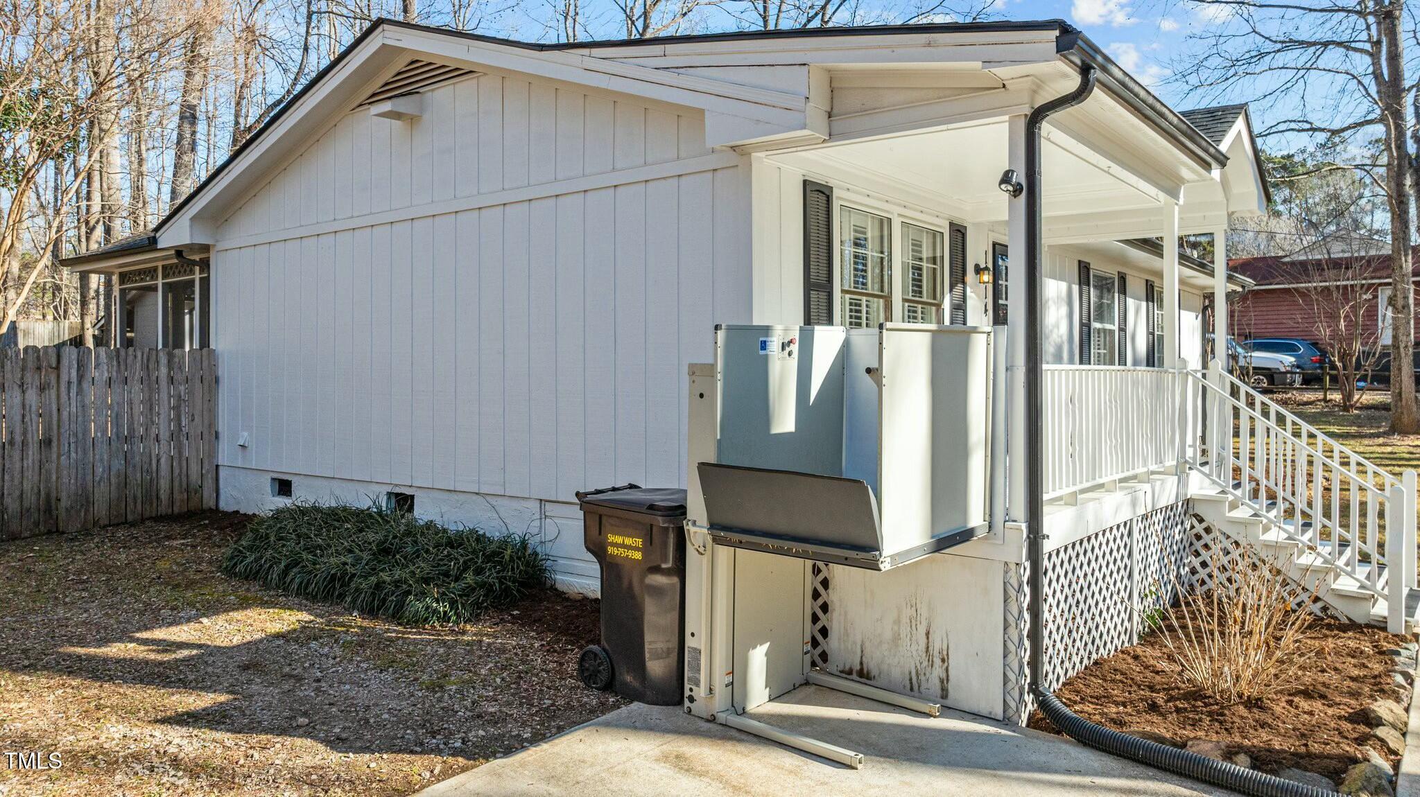 1014 Holden Road Youngsville, NC 27596 - Photo 34 of 54 a front view of a house with street