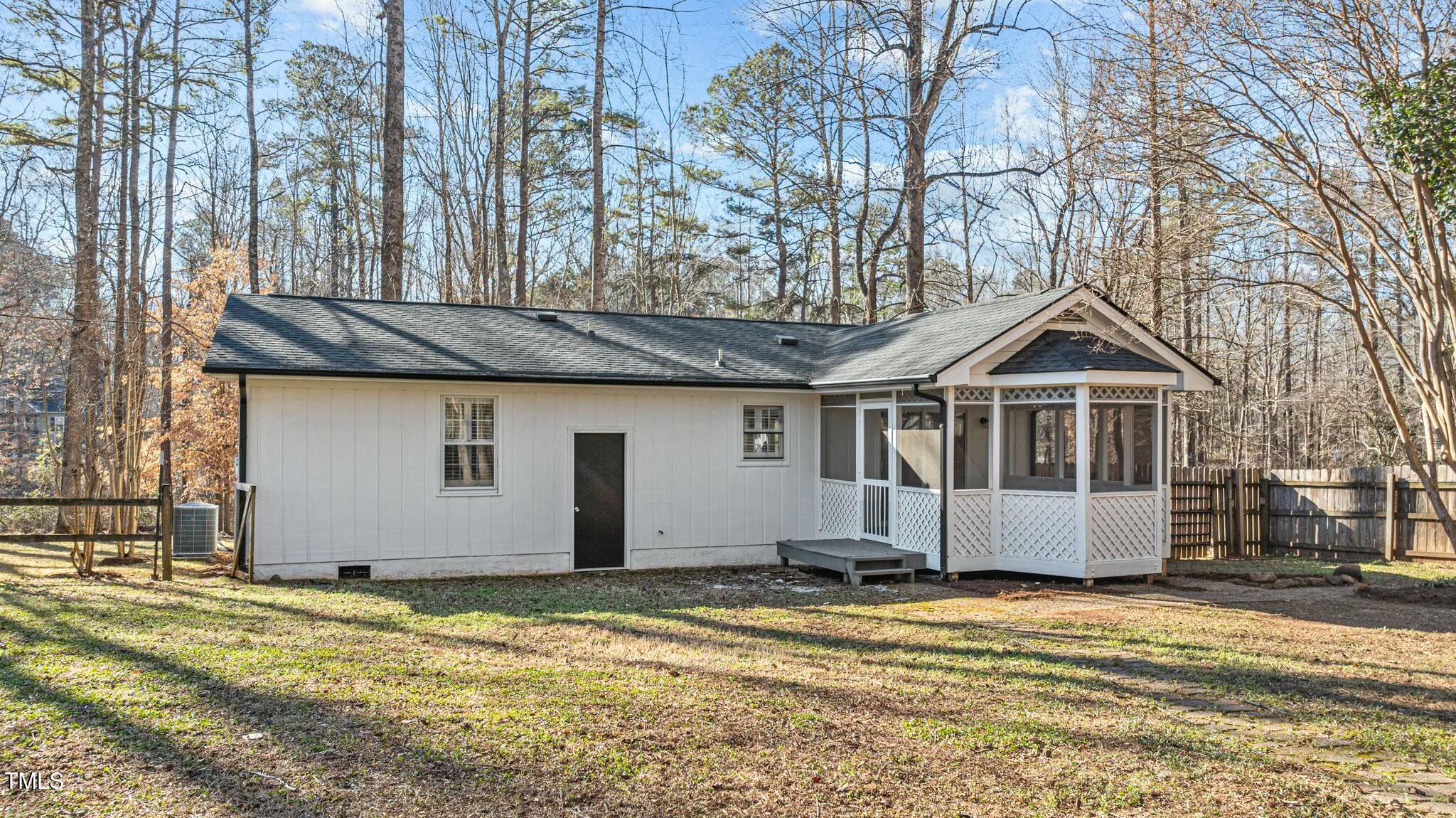 1014 Holden Road Youngsville, NC 27596 - Photo 37 of 54 a front view of a house with a yard