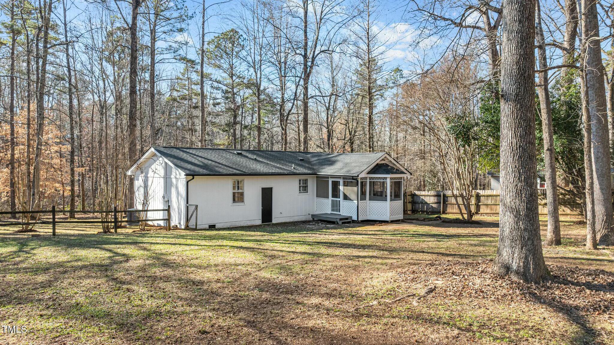1014 Holden Road Youngsville, NC 27596 - Photo 41 of 54 a front view of a house with a yard