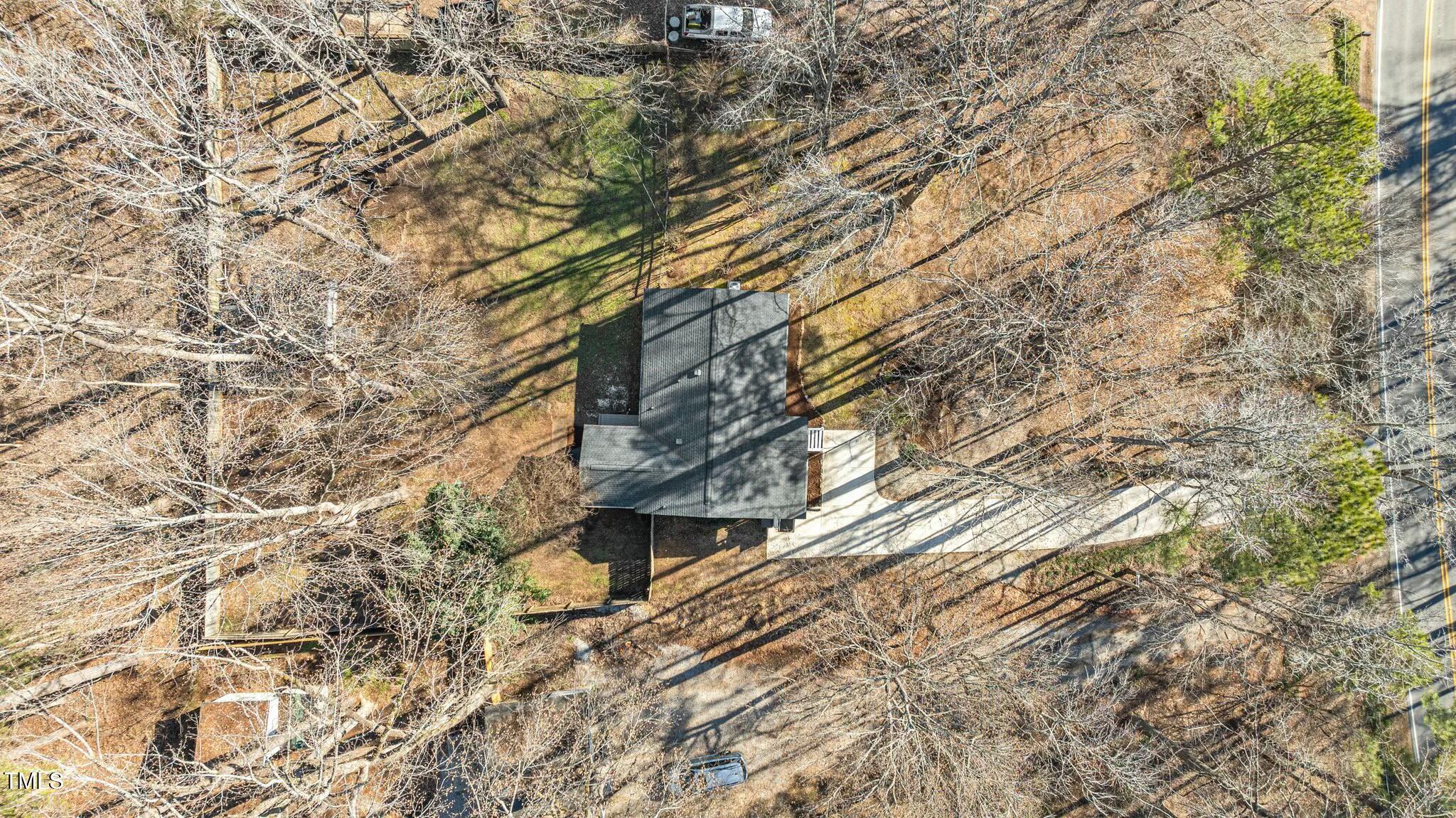 1014 Holden Road Youngsville, NC 27596 - Photo 44 of 54 a backyard of a building