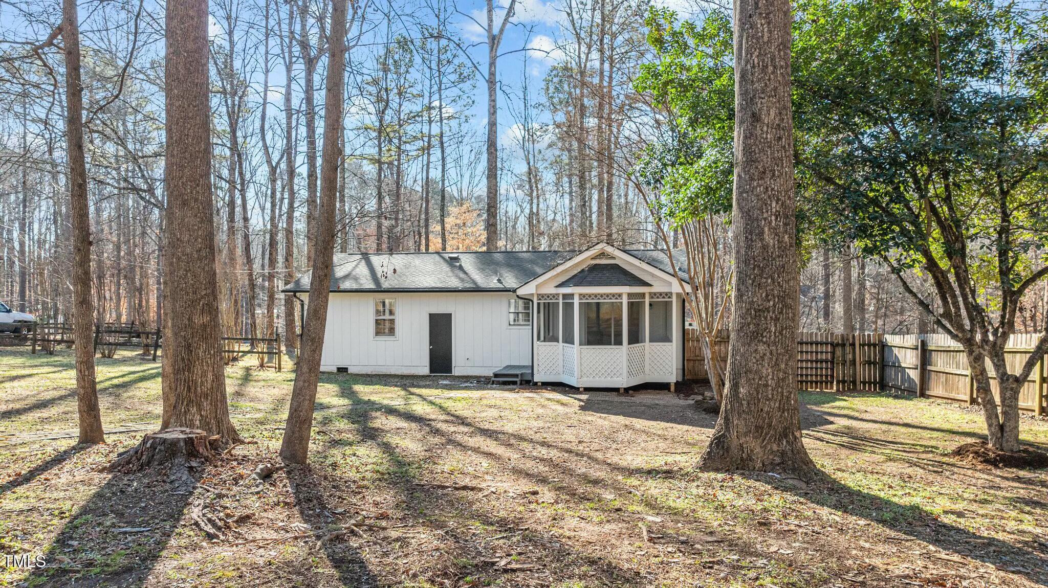 1014 Holden Road Youngsville, NC 27596 - Photo 51 of 54 a view of a house with a yard covered in snow