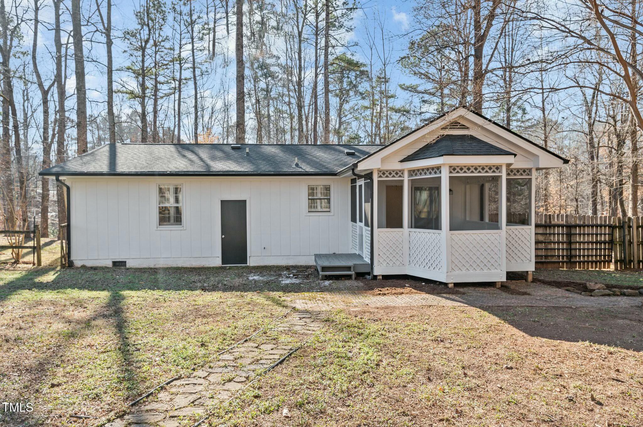 1014 Holden Road Youngsville, NC 27596 - Photo 52 of 54 a front view of a house with a yard