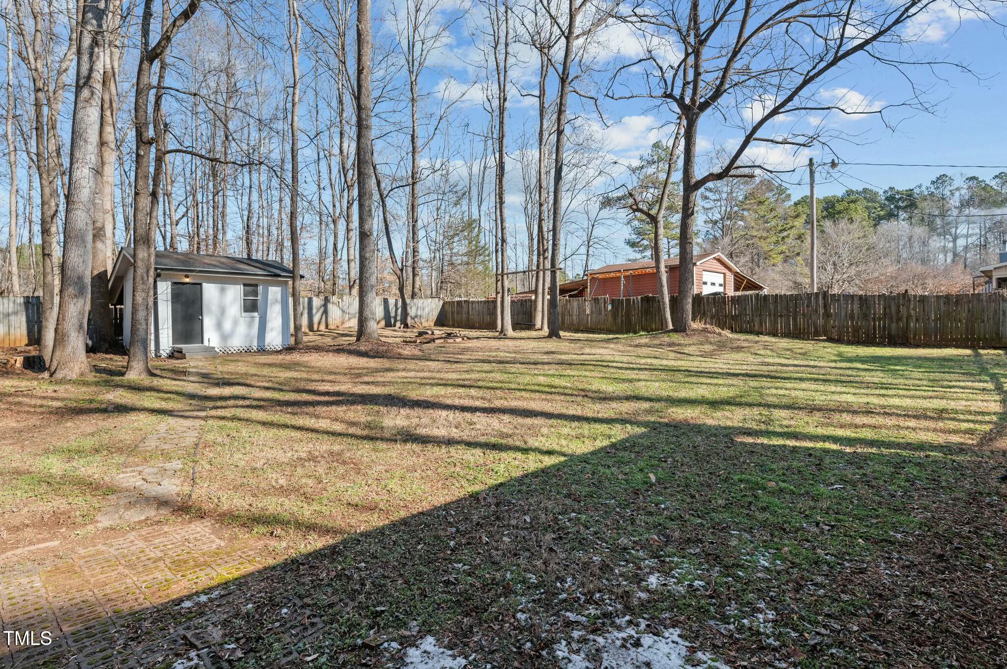1014 Holden Road Youngsville, NC 27596 - Photo 53 of 54 a swimming pool with outdoor seating