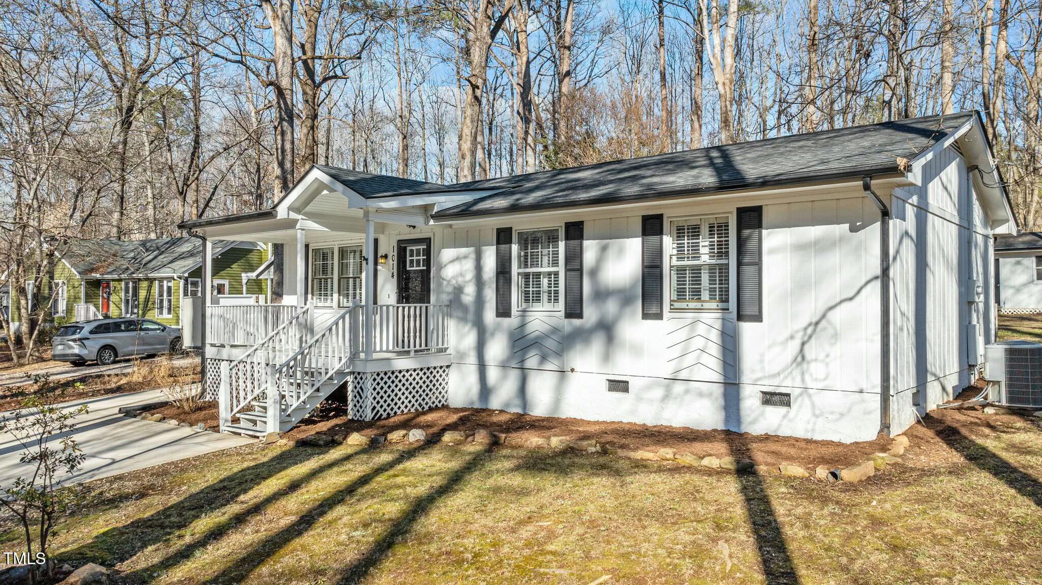 1014 Holden Road Youngsville, NC 27596 - Photo 10 of 54 a front view of a house with a yard