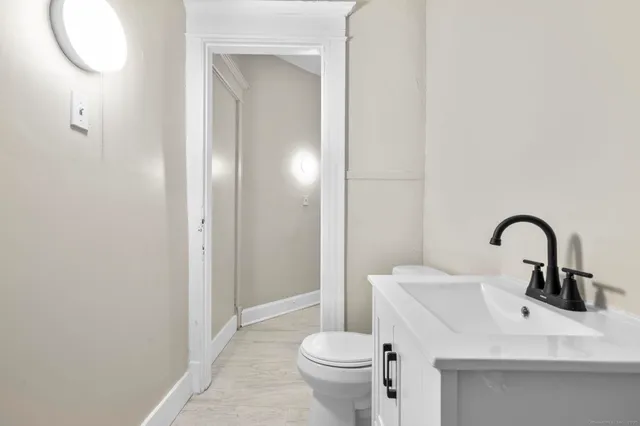 a bathroom with a sink and a toilet