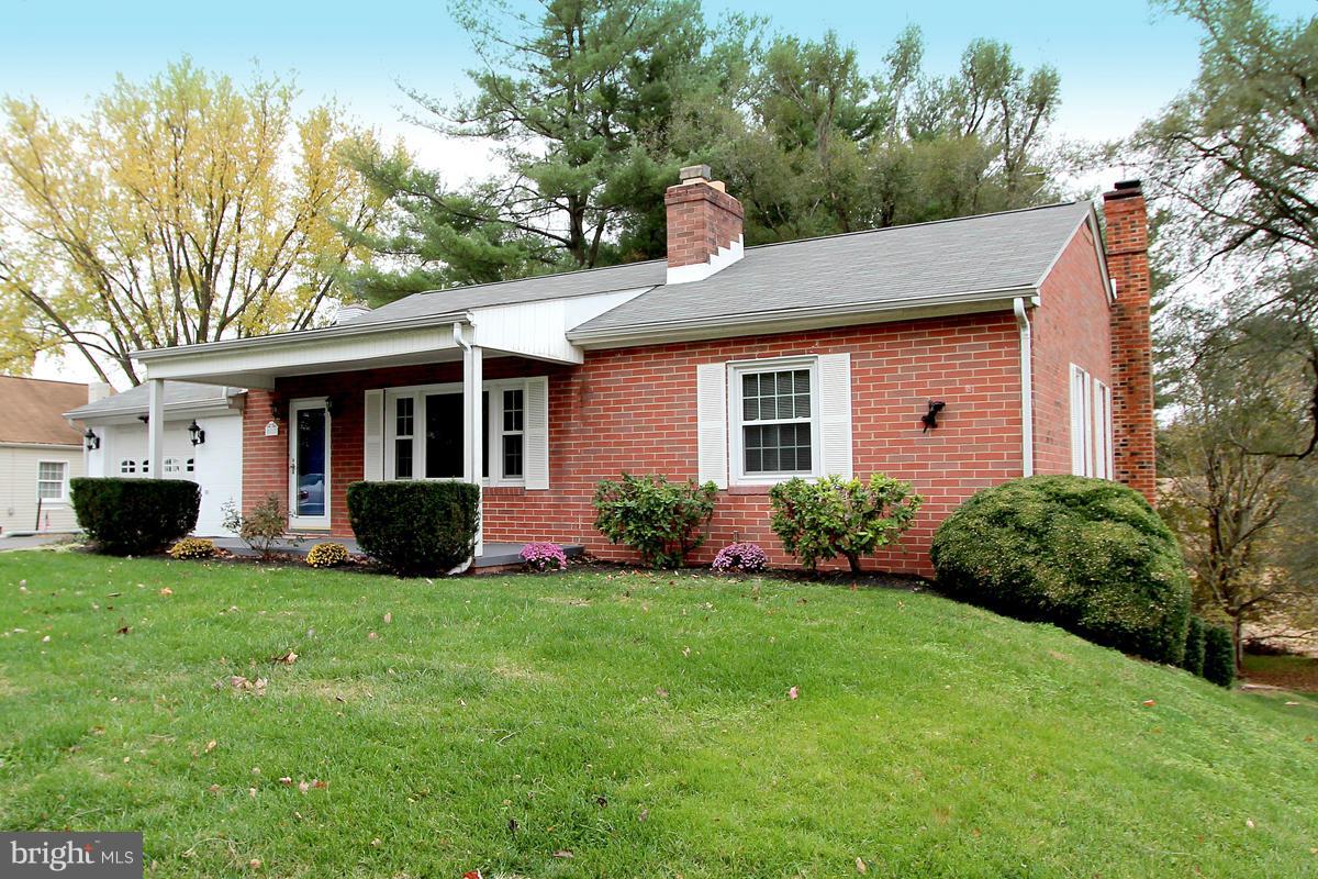 5017 Teen Barnes Road Frederick, MD 21703 - Photo 2 of 30 a view of a house with a yard and plants