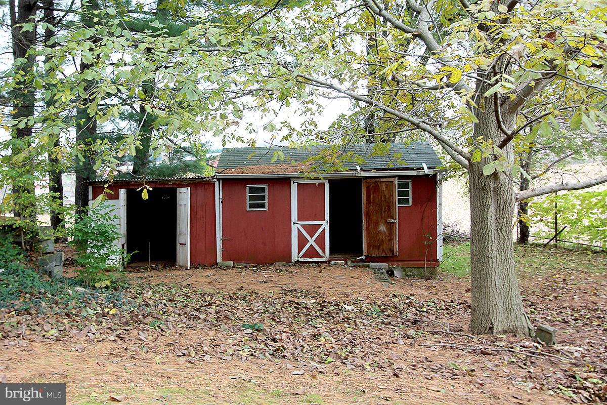 5017 Teen Barnes Road Frederick, MD 21703 - Photo 29 of 30 a front view of a house with a yard