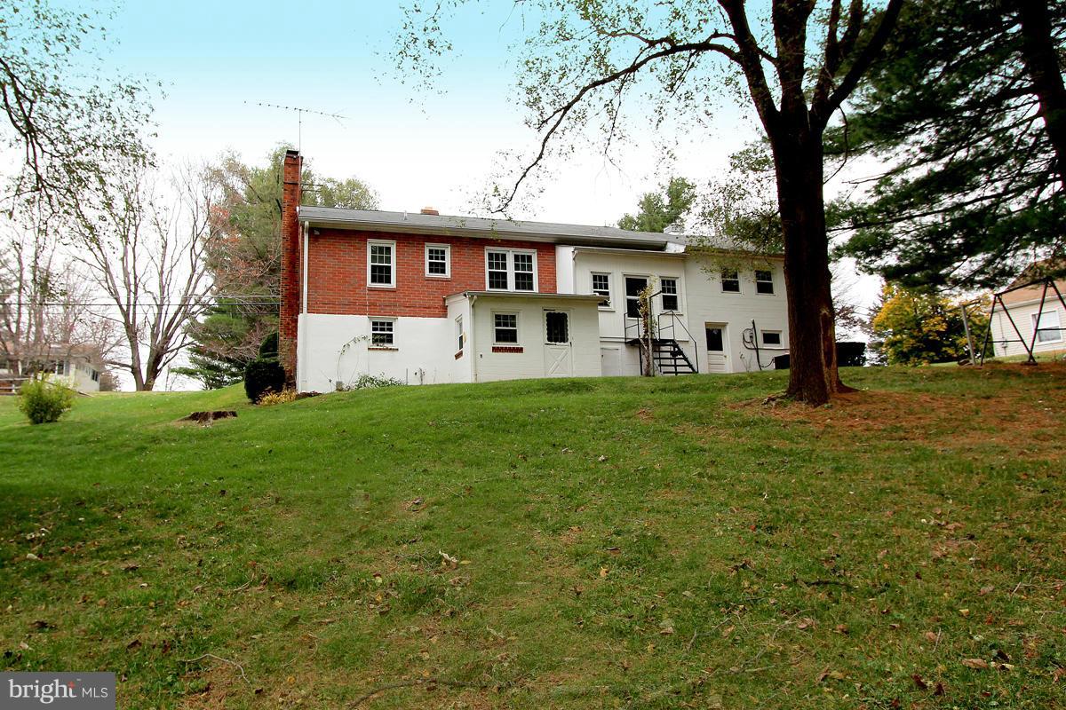 5017 Teen Barnes Road Frederick, MD 21703 - Photo 30 of 30 a front view of a house with a yard