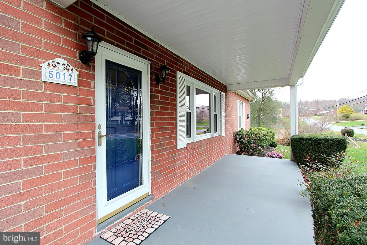 5017 Teen Barnes Road Frederick, MD 21703 - Photo 4 of 30 a view of a brick house with a large window