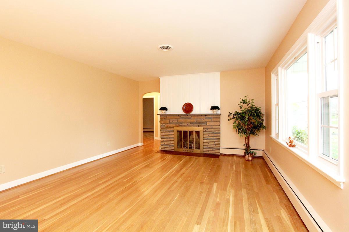 5017 Teen Barnes Road Frederick, MD 21703 - Photo 6 of 30 a view of a fireplace with a window