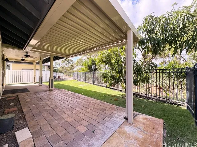 a view of a backyard with garden