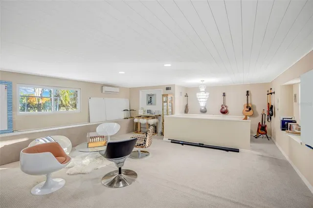 a view of a storage and utility room with a washer dryer