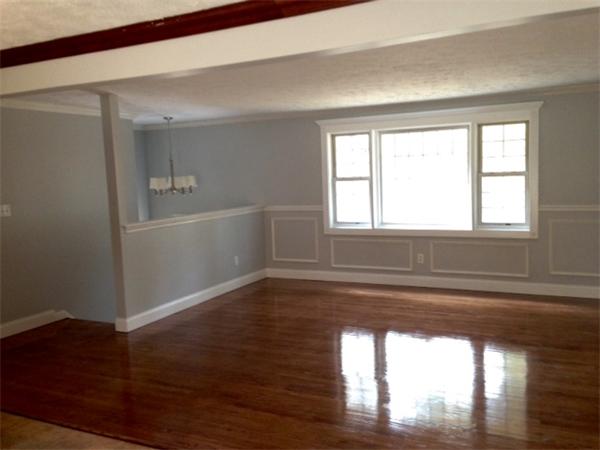 3 Lake Ridge Drive Holland, MA 01521 - Photo 4 of 9 a view of empty room with wooden floor and fan