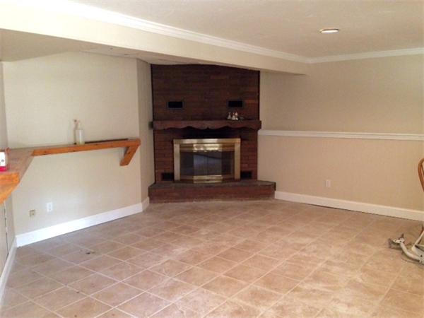 3 Lake Ridge Drive Holland, MA 01521 - Photo 6 of 9 a view of empty room with a fireplace