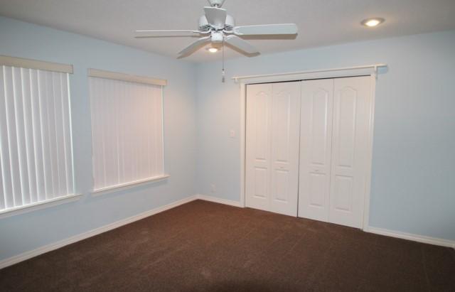 325 Ridge Lake Road Crestview, FL 32536 - Photo 28 of 64 an empty room with fan and windows