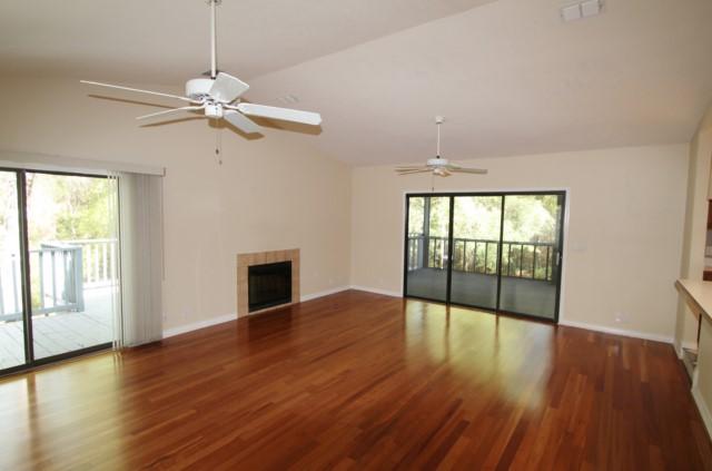 325 Ridge Lake Road Crestview, FL 32536 - Photo 4 of 64 a view of empty room with wooden floor and fan