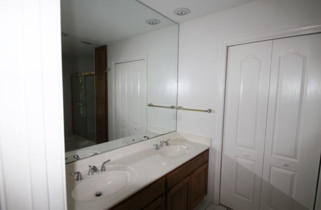 325 Ridge Lake Road Crestview, FL 32536 - Photo 37 of 64 a bathroom with a sink and a mirror