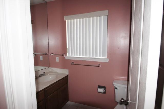 325 Ridge Lake Road Crestview, FL 32536 - Photo 40 of 64 a bathroom with a sink and a window