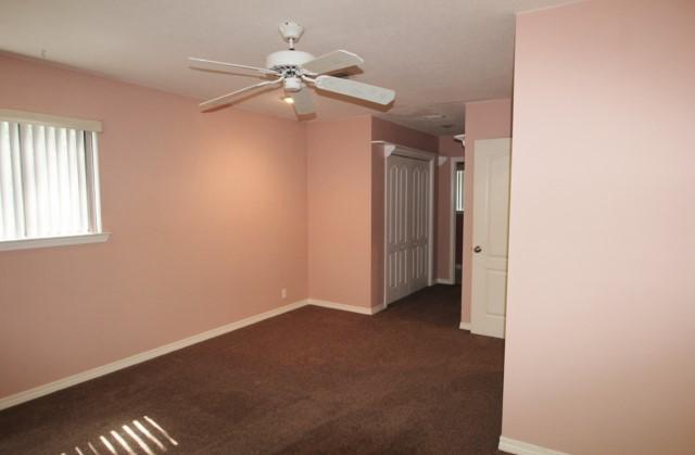 325 Ridge Lake Road Crestview, FL 32536 - Photo 41 of 64 an empty room with windows and fan
