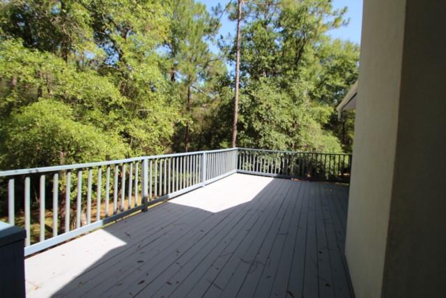 325 Ridge Lake Road Crestview, FL 32536 - Photo 9 of 64 a view of balcony with wooden floor