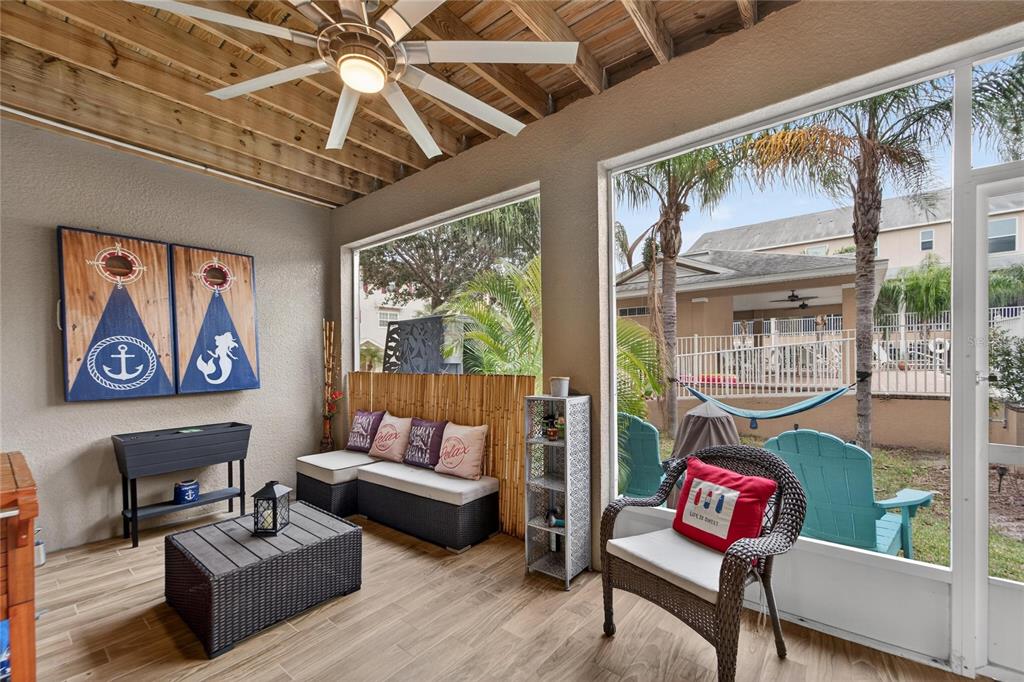 829 Callista Cay Loop Tarpon Springs, FL 34689 - Photo 28 of 91 a living room with furniture and a large window