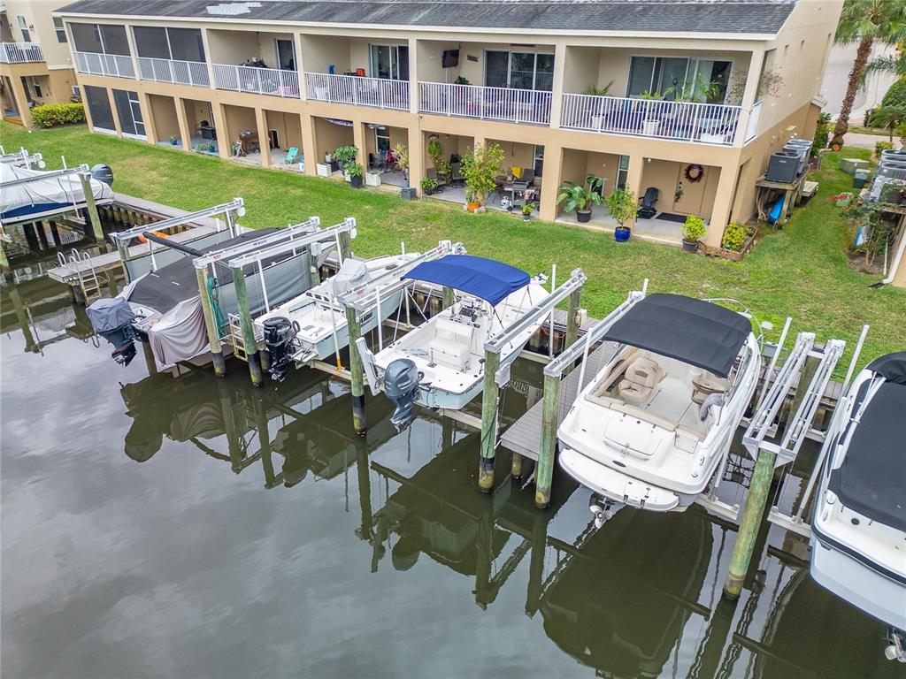 829 Callista Cay Loop Tarpon Springs, FL 34689 - Photo 4 of 91 a view of a house with backyard porch and patio