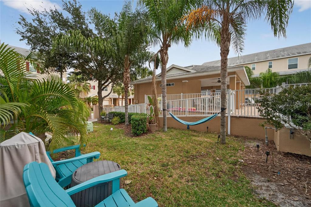 829 Callista Cay Loop Tarpon Springs, FL 34689 - Photo 71 of 91 a view of a house with a yard and sitting area