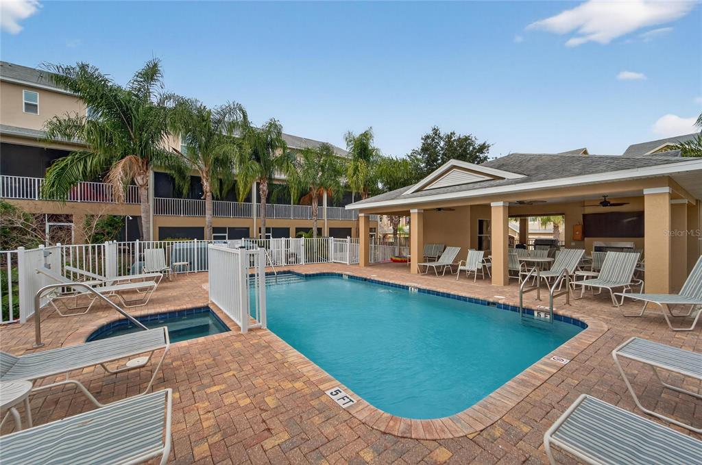 829 Callista Cay Loop Tarpon Springs, FL 34689 - Photo 74 of 91 a view of a house with pool and chairs