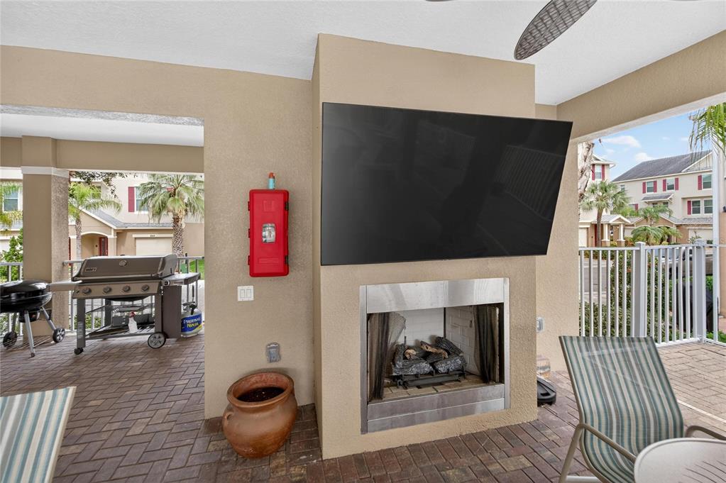 829 Callista Cay Loop Tarpon Springs, FL 34689 - Photo 78 of 91 a living room with furniture and a flat screen tv
