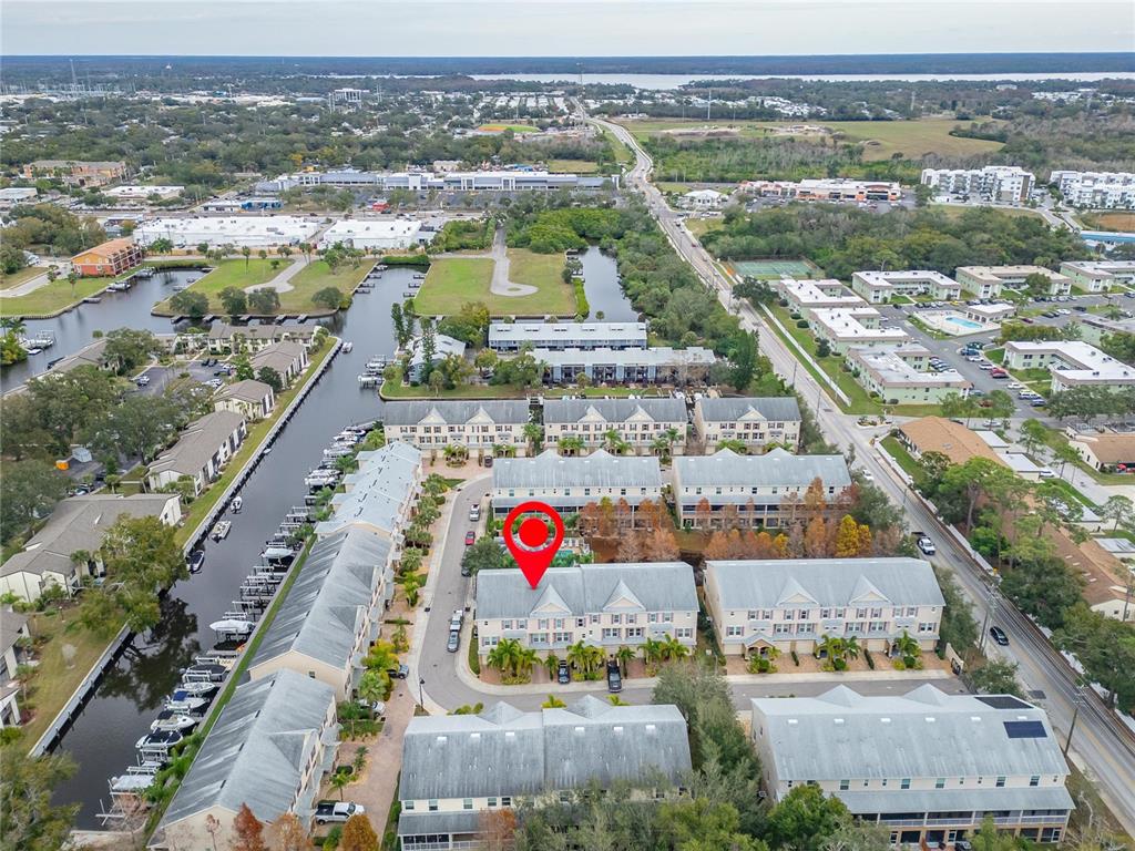 829 Callista Cay Loop Tarpon Springs, FL 34689 - Photo 81 of 91 an aerial view of residential houses with outdoor space