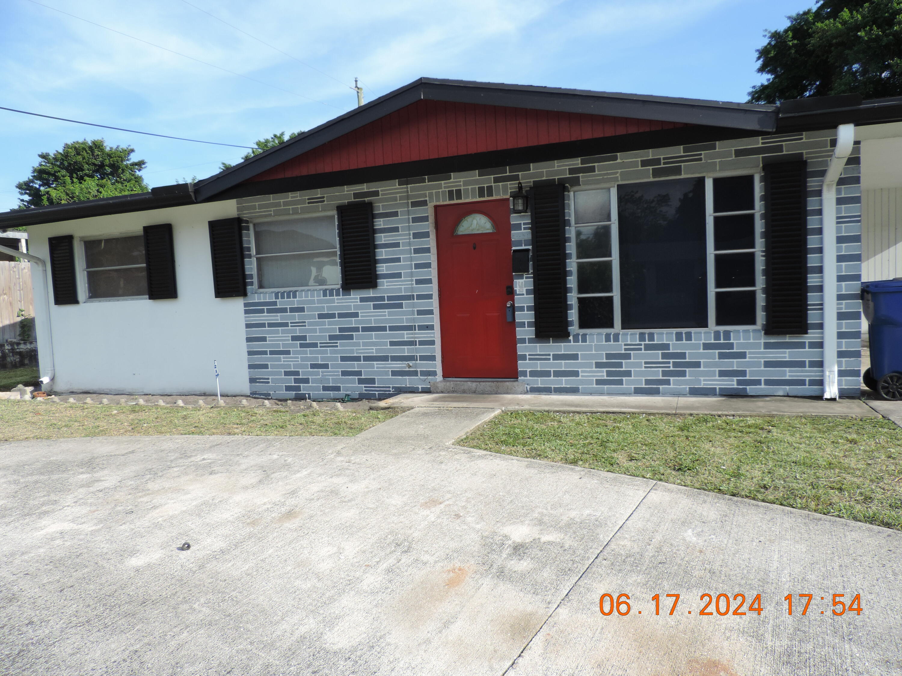 1611 West 35th Street Riviera Beach, FL 33404 - Photo 1 of 1 Front