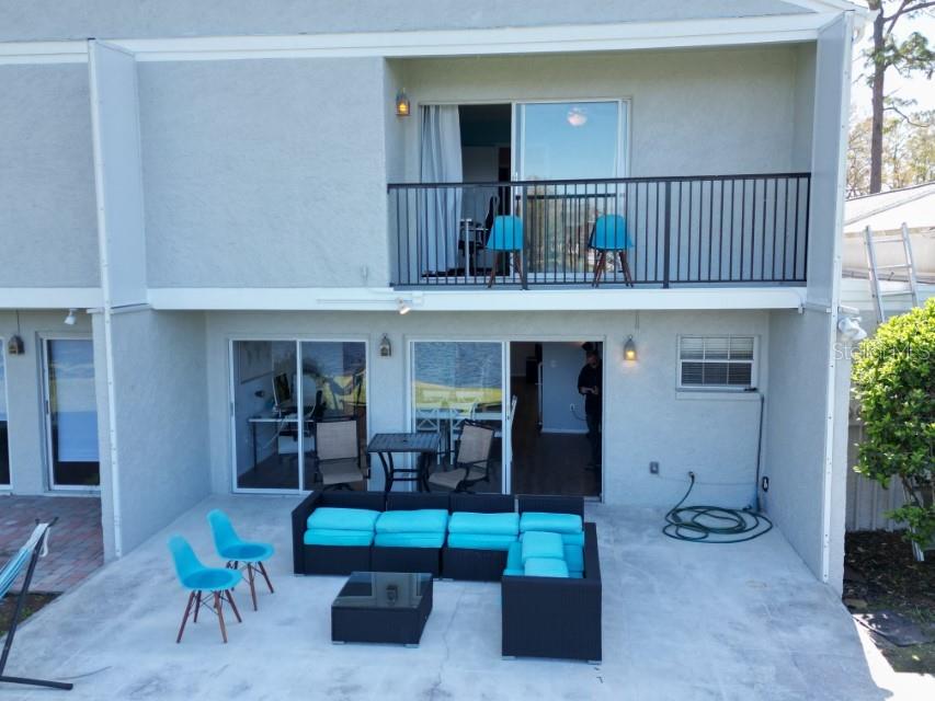 5348 Saddlebrook Way, Unit 2 Wesley Chapel, FL 33543 - Photo 25 of 38 a hallway with furniture and a window