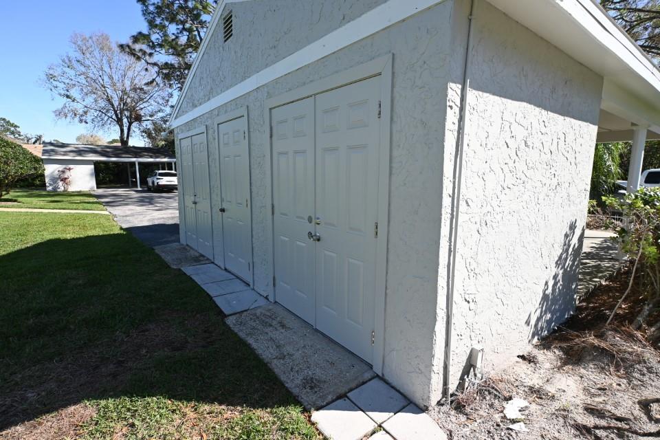 5348 Saddlebrook Way, Unit 2 Wesley Chapel, FL 33543 - Photo 34 of 38 a view of a yard from a corridor