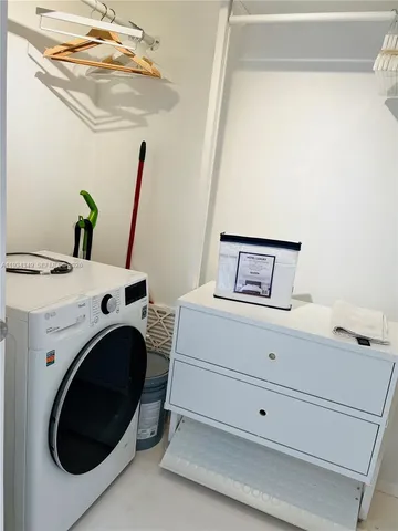 a front view of a building with parking space