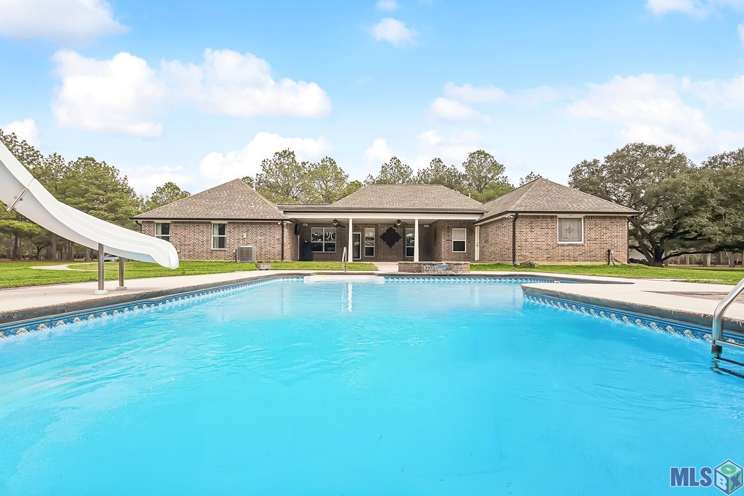15182 Sterling Smith Road Roseland, LA 70456 - Photo 21 of 31 Pool & Rear of Home