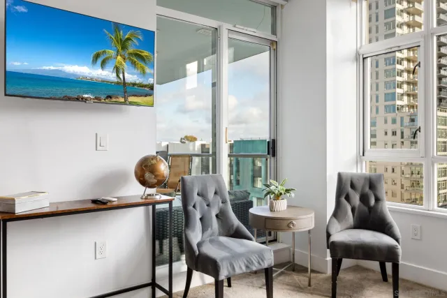 a dining room with furniture and window
