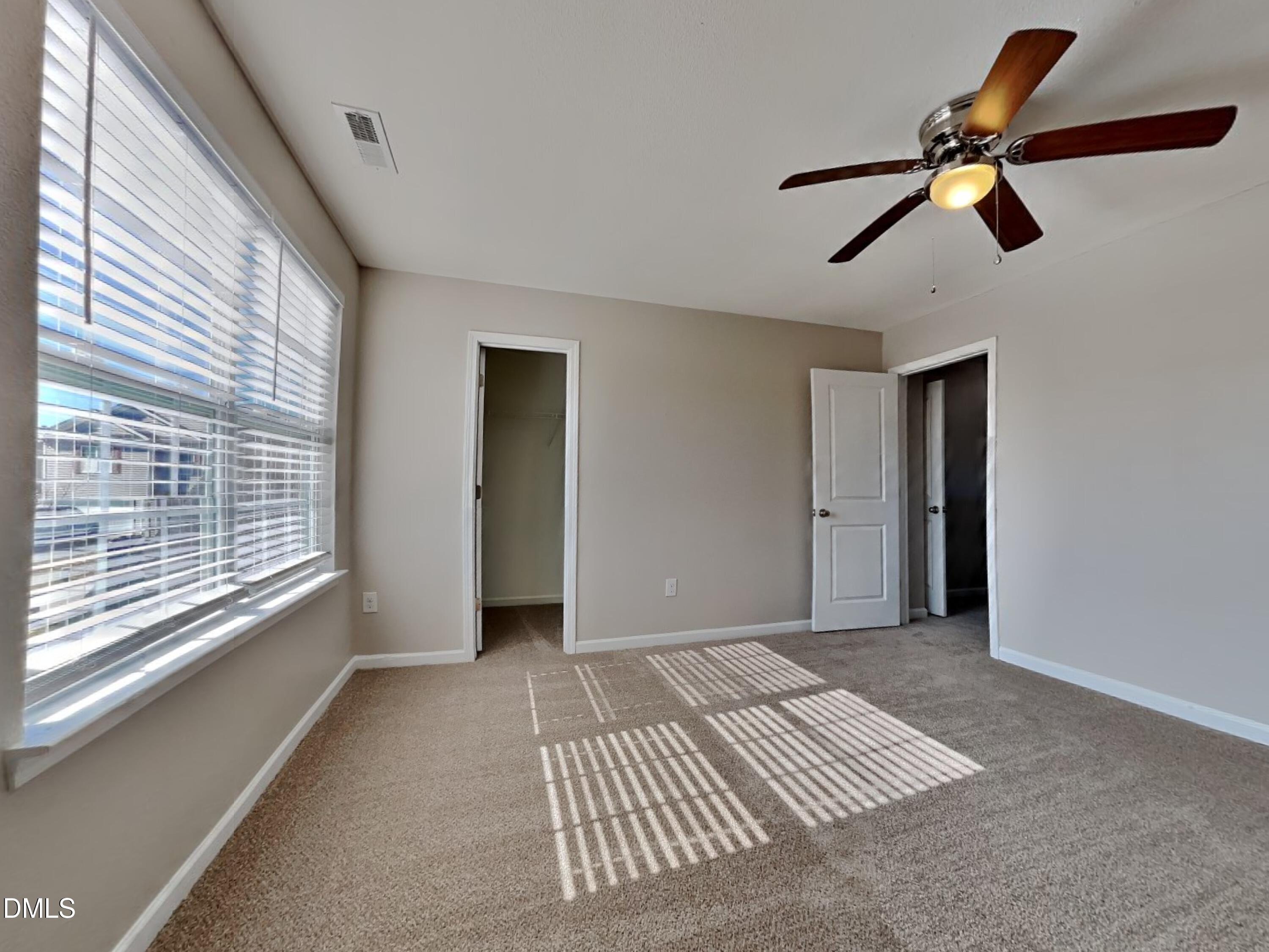 42 Folkstone Court Bunnlevel, NC 28323 - Photo 17 of 20 a view of an empty room with a window