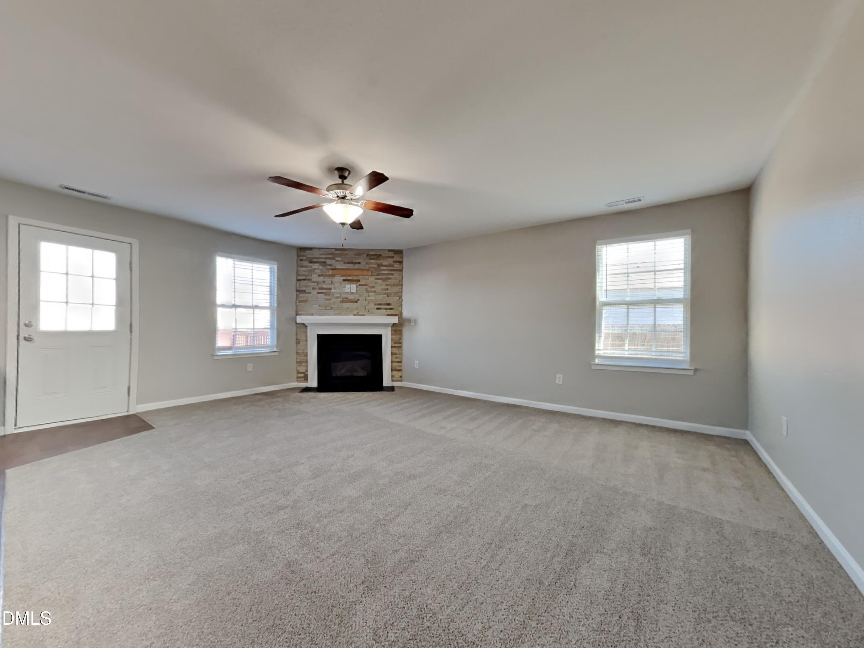 42 Folkstone Court Bunnlevel, NC 28323 - Photo 2 of 20 a view of an empty room with a window