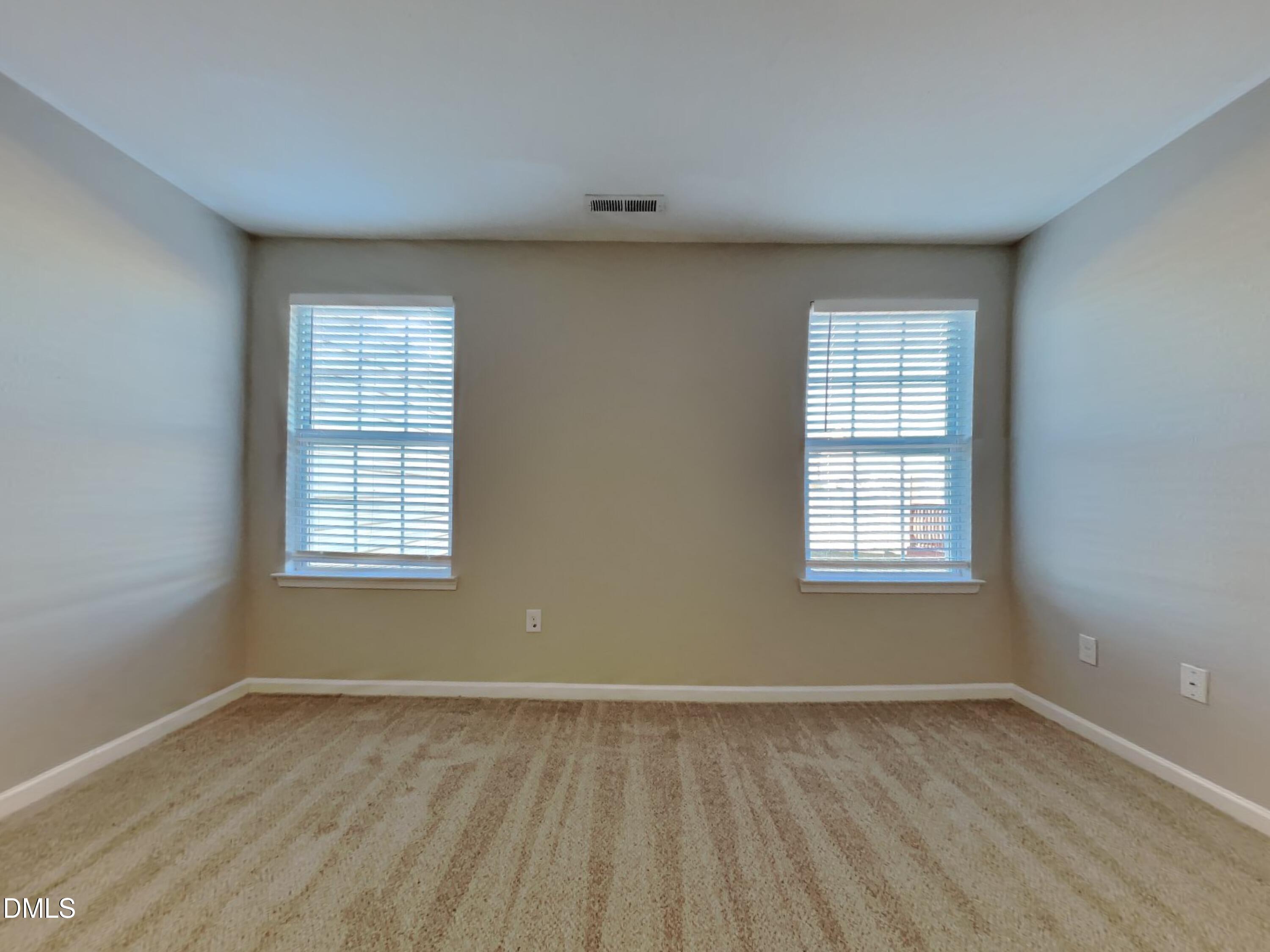 42 Folkstone Court Bunnlevel, NC 28323 - Photo 6 of 20 an empty room with a window