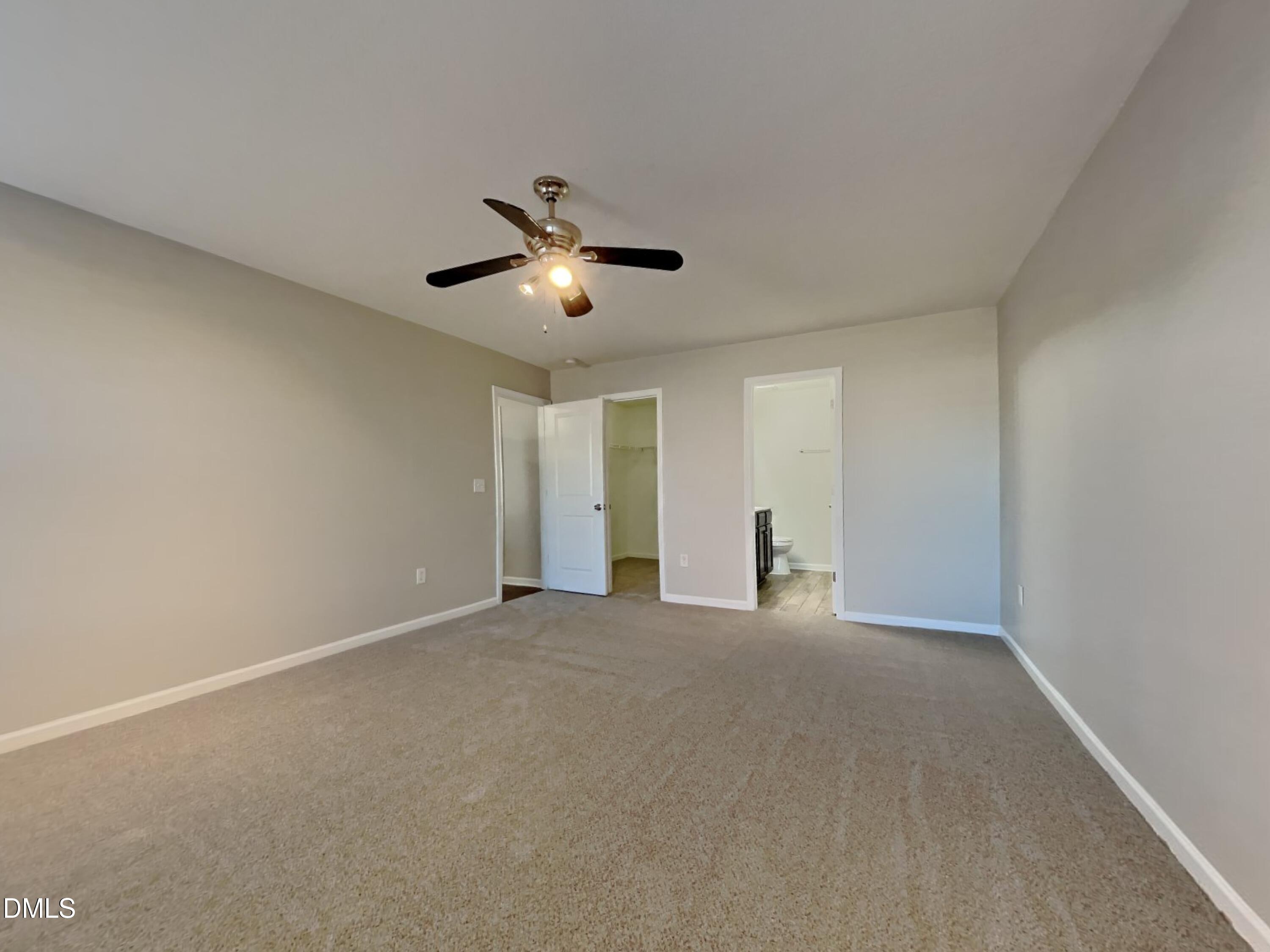 42 Folkstone Court Bunnlevel, NC 28323 - Photo 7 of 20 a view of an empty room with a window