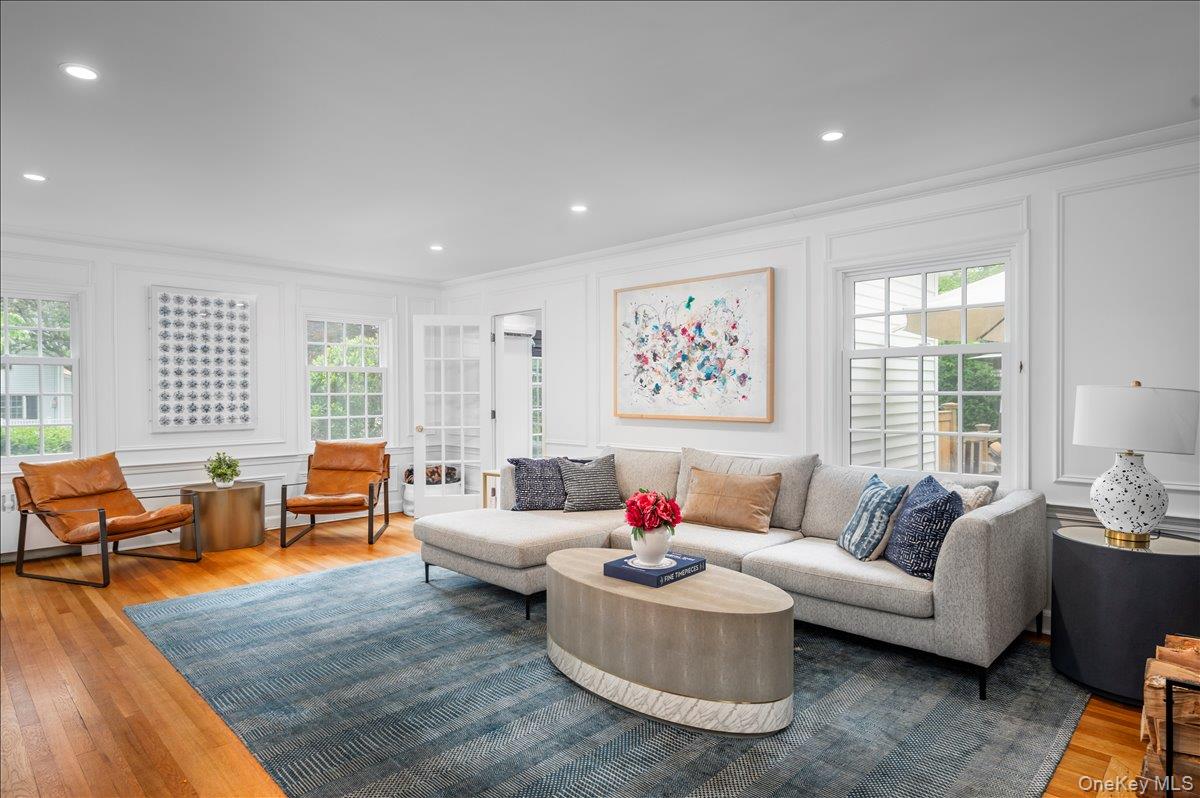 49 Eton Road Larchmont, NY 10538 - Photo 6 of 34 a living room with furniture and wooden floor