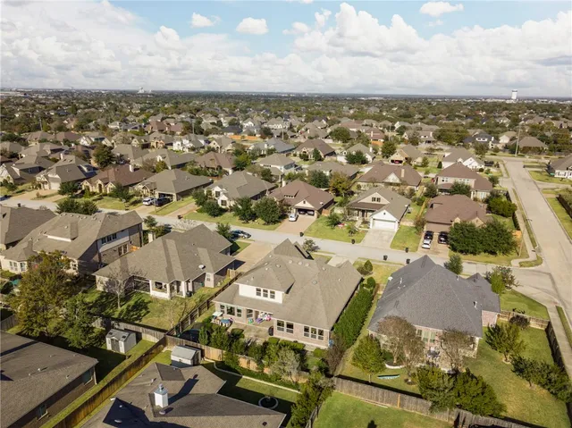an aerial view of residential building with outdoor space