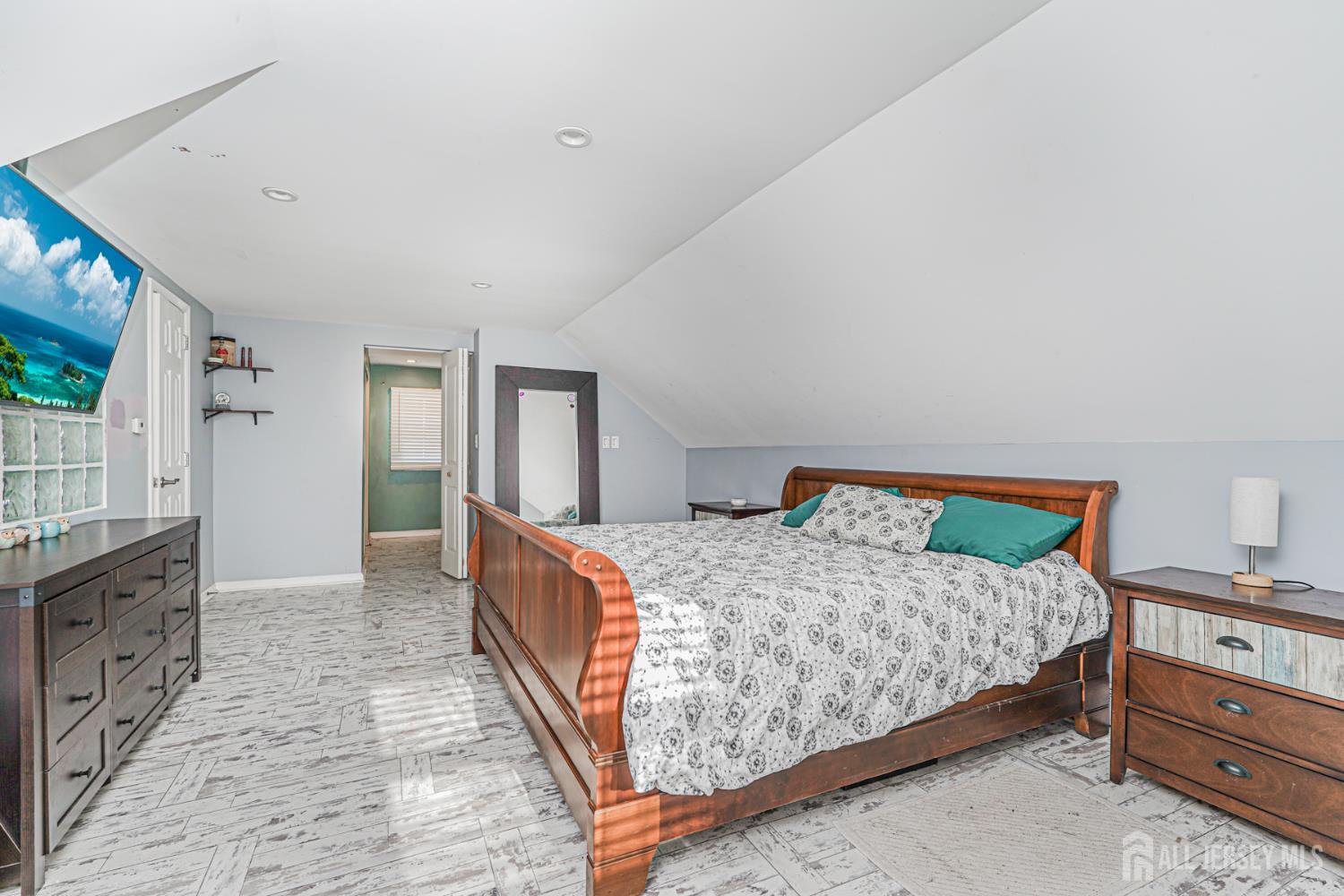 7 Walnut Lane Parlin, NJ 08859 - Photo 15 of 23 a bedroom with a bed and a cabinets