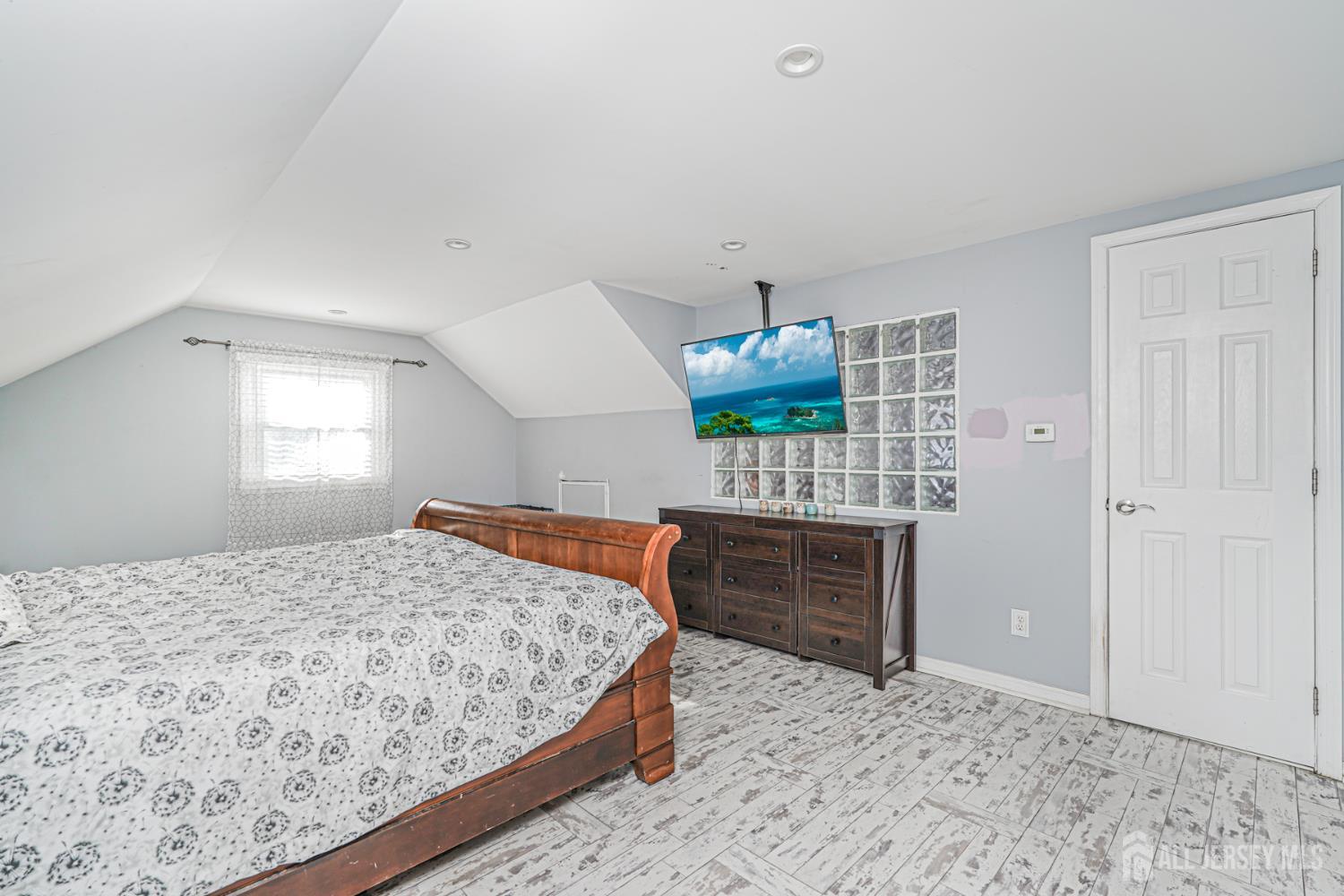 7 Walnut Lane Parlin, NJ 08859 - Photo 16 of 23 a bedroom with furniture and a bed